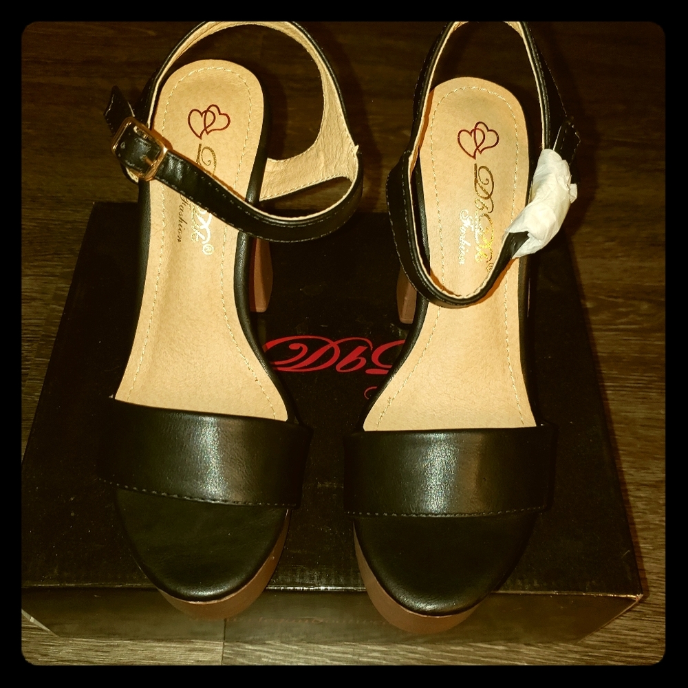 Black strap wedge heels